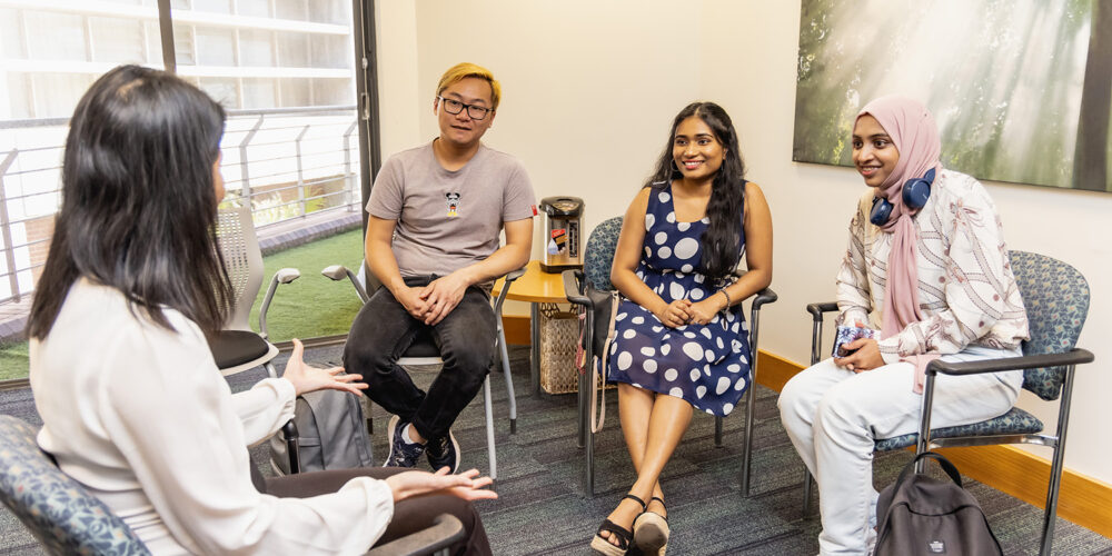 A group of students attending a workshop