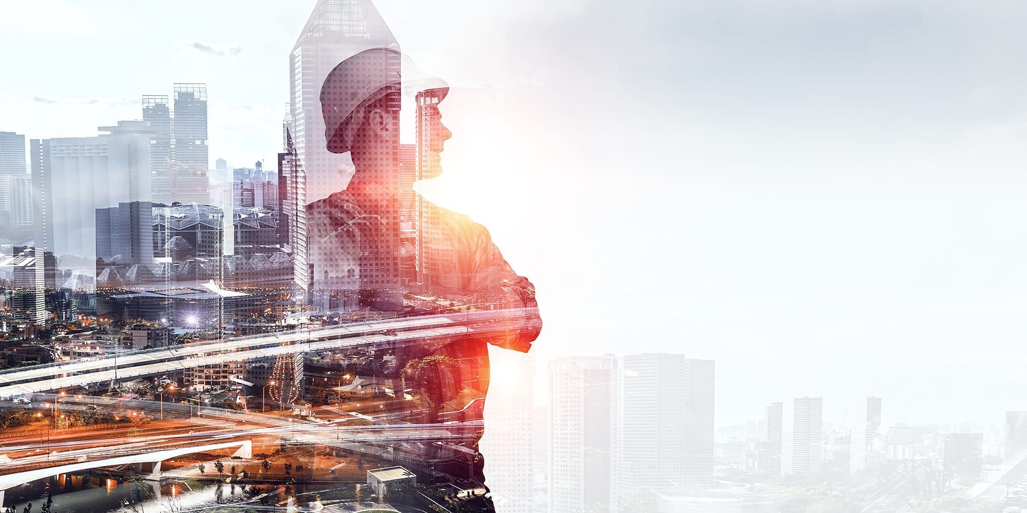 Graphic of a worker in a hard hat superimposed on a city scape