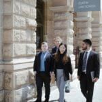 A group of four students leaving the Curtin law school in the city