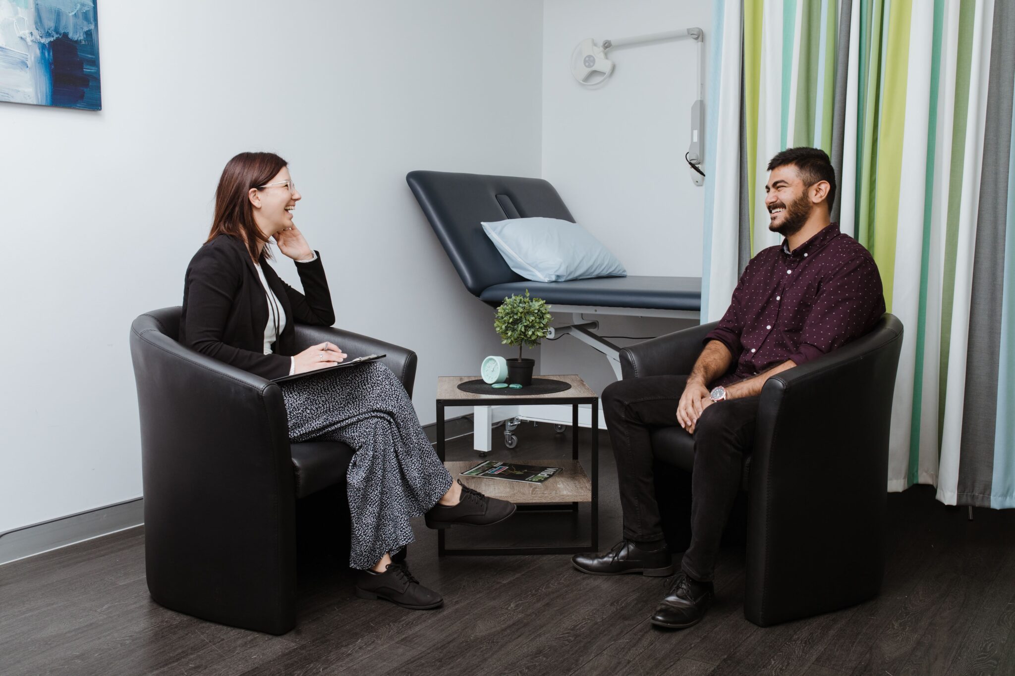 Young female psychology student chats with a client