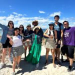 Faculty of Business and Law students smiling for a group photo at Rottnest Isalnd.