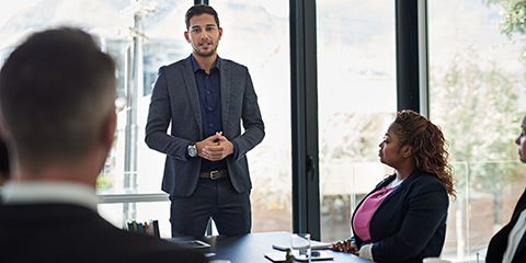 Shot of an executive giving a presentation to colleagues in a boardroom