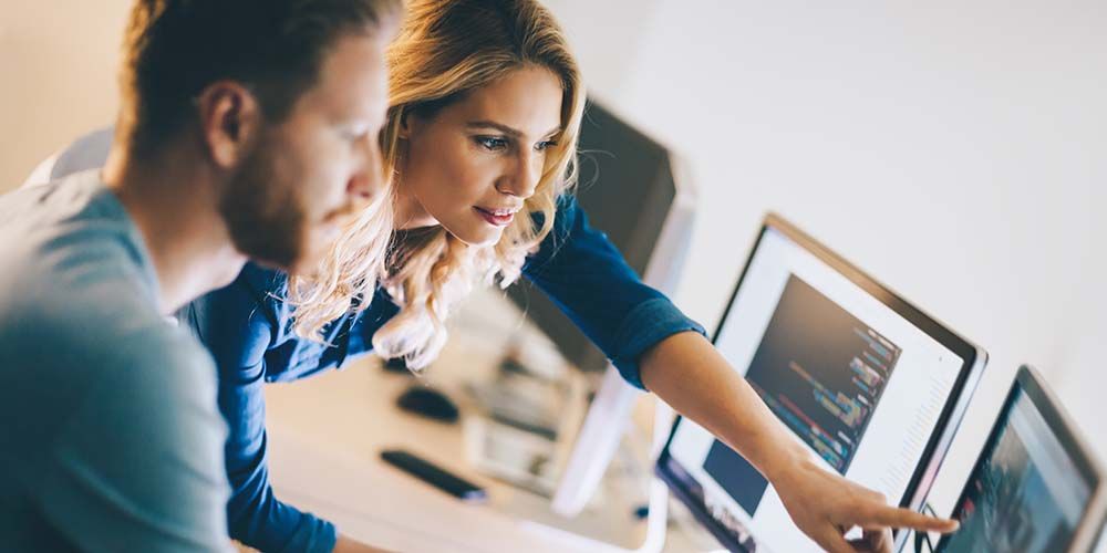 Programmer working in a software developing company office