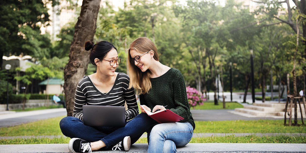 Two female students studying together