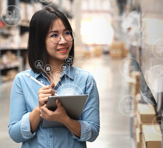 Supply chain management professional inspecting a warehouse 