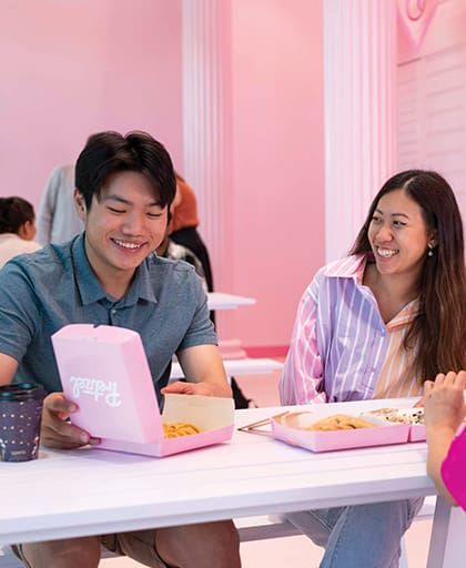 Students enjoying a snack at Pretzel's