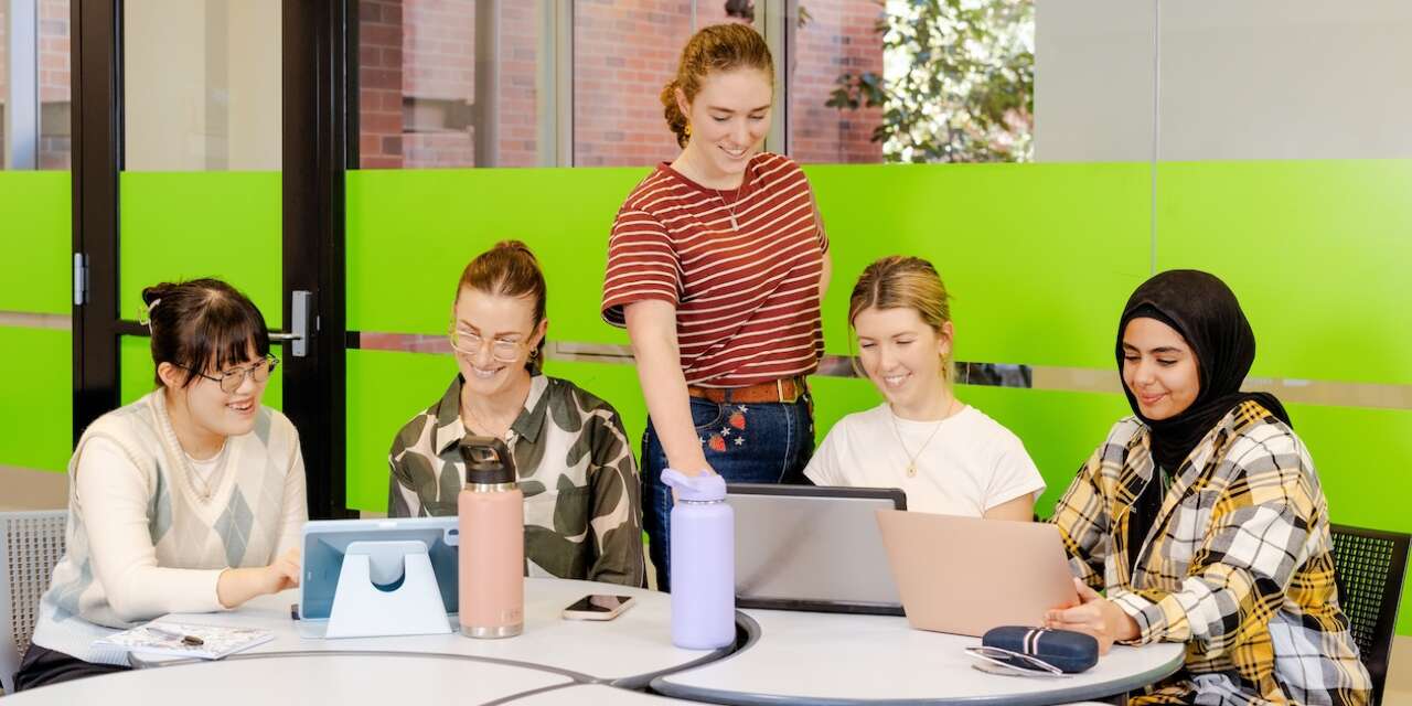 5 students at desk