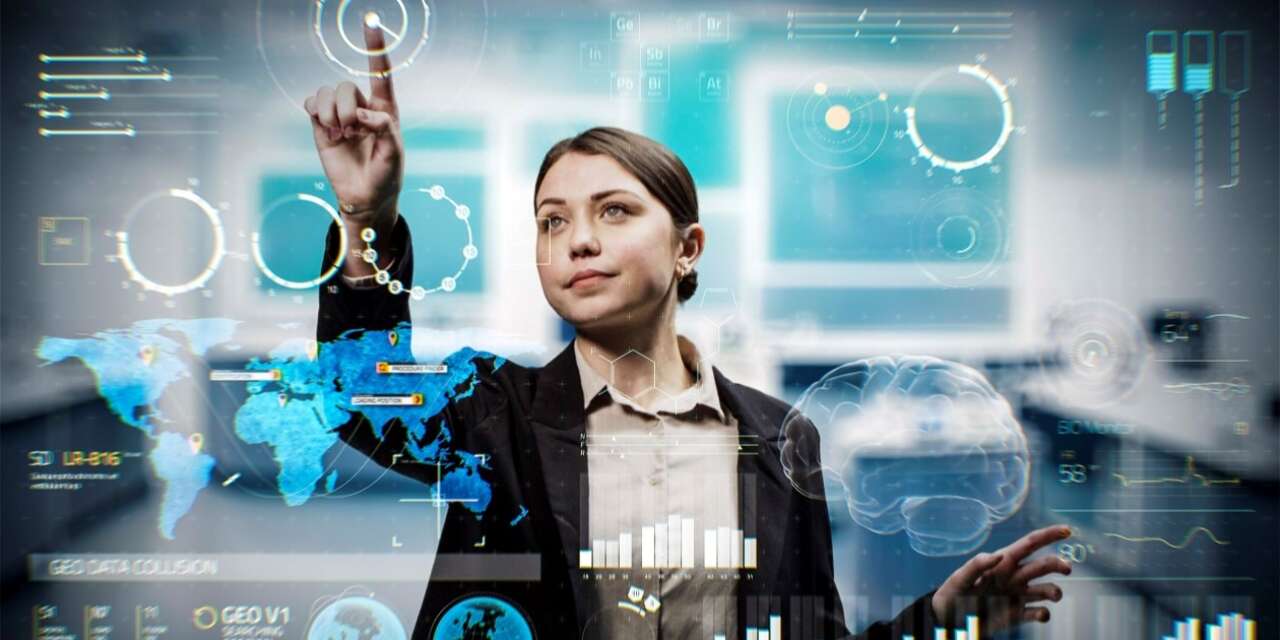 Women pointing at data on screen