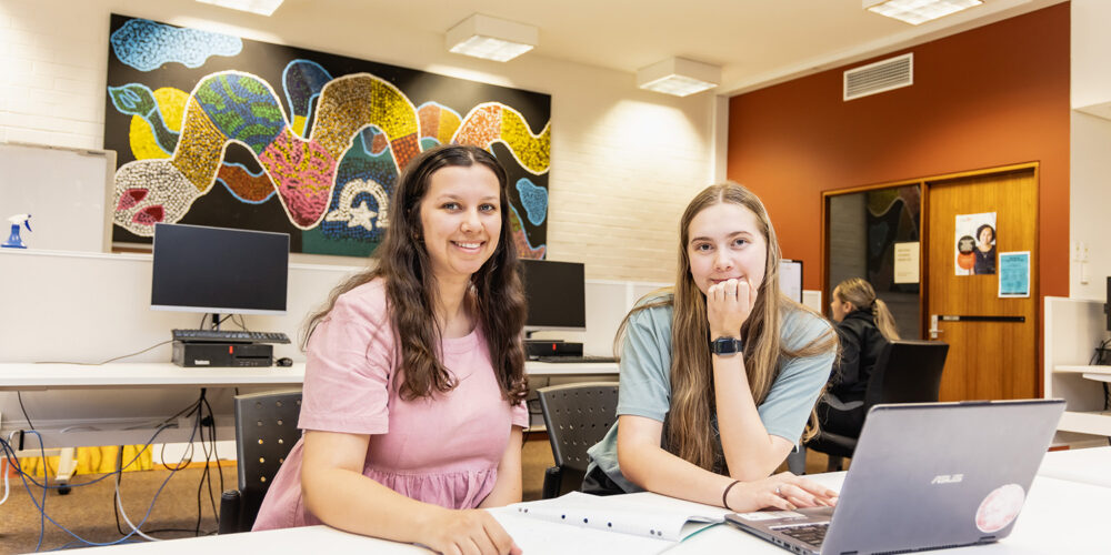 Two Indigenous students studying in the CAS computer labs